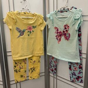 SET!  4 pieces. Girls pants and t shirts. Colorful and fun. Size M
